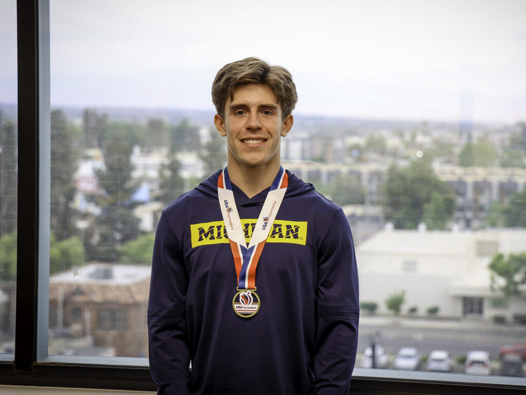 Senior Spotlight: Troy Holman, A Champion in the Gym and the Classroom