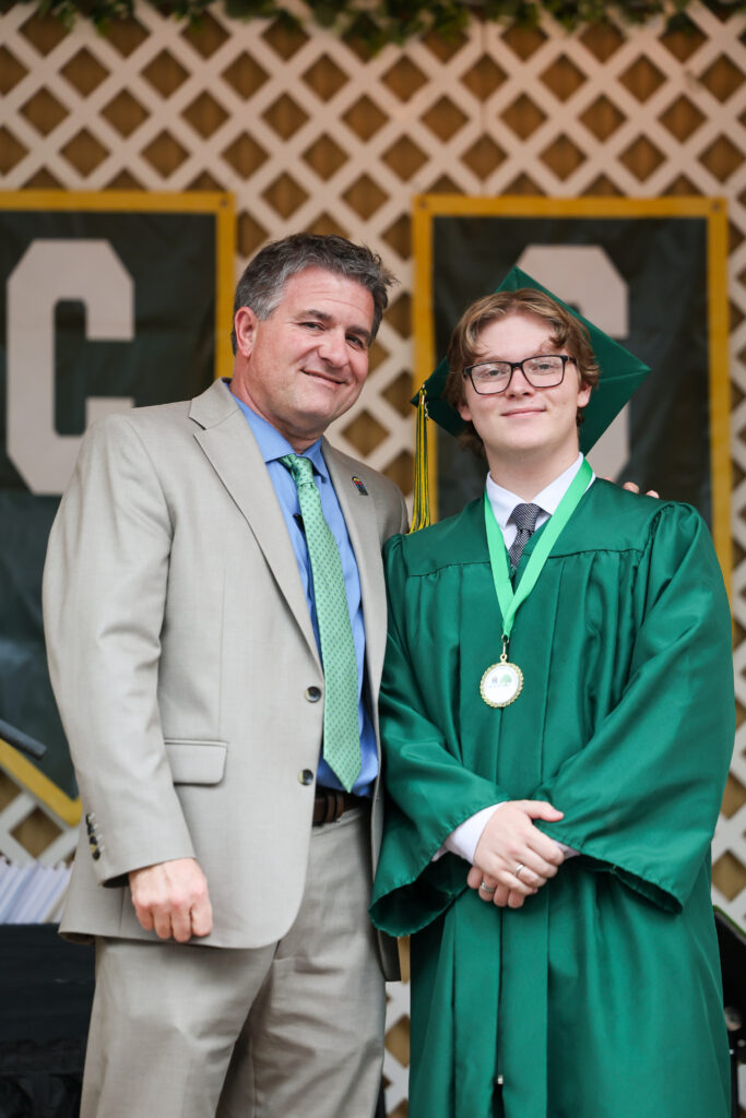 Dr. Mendiburu poses with 12th grader Nathaniel Wheeler.
