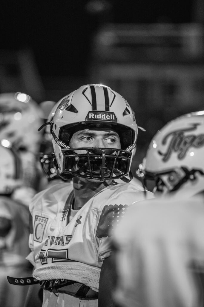 A close up shot of Bradyon Ricks' face on the football field. 