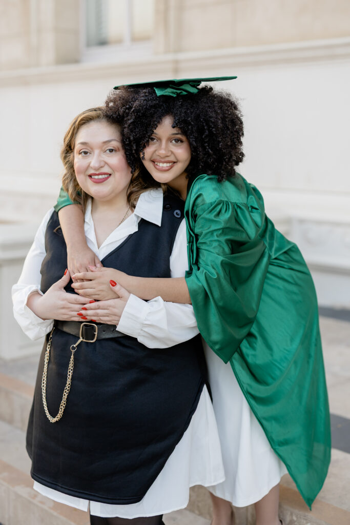 Wright and her mother posing for her graduation photos.