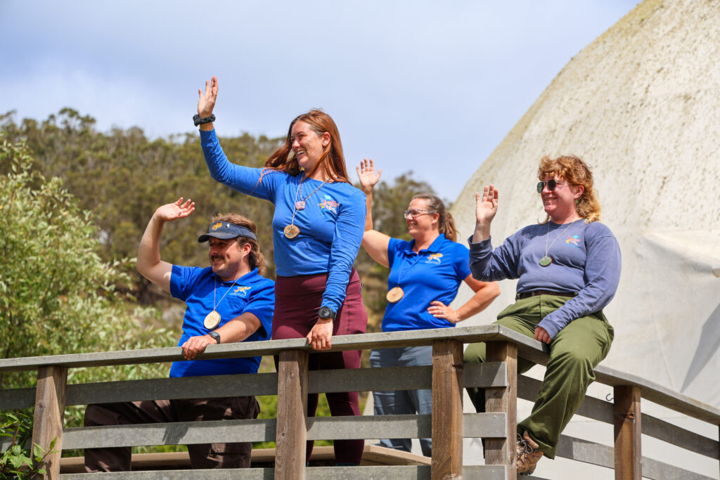 Naturalists waving goodbye to the students. 