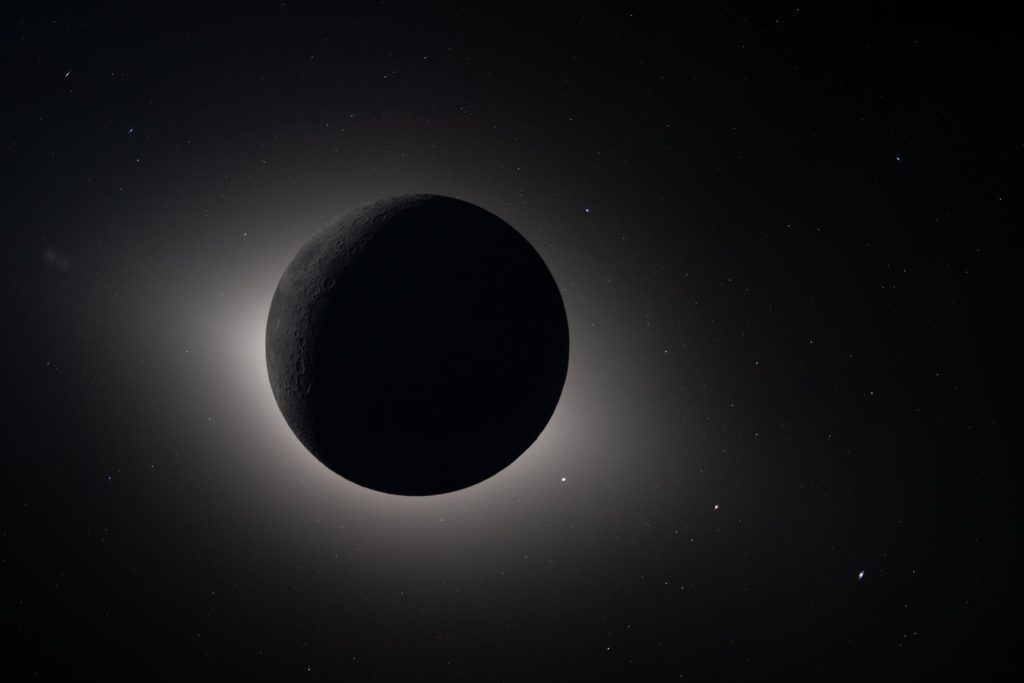 Photo provided by NASA from the Artemis II mission featuring a solar eclipse behind the moon.
